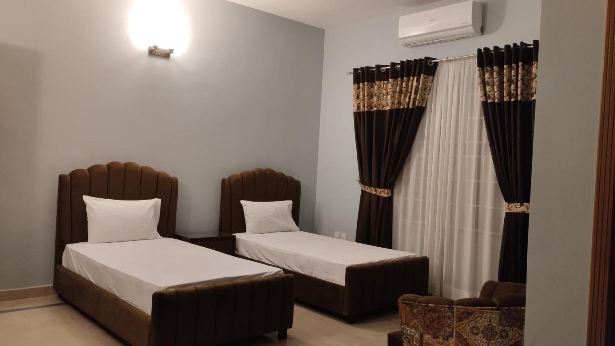 Islamabad Travelodge Guest House Bilik gambar